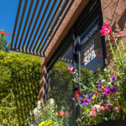 Sedona New Day Spa front door in Spring with bright colored flowers
