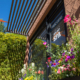 Sedona New Day Spa front door in Spring with bright colored flowers